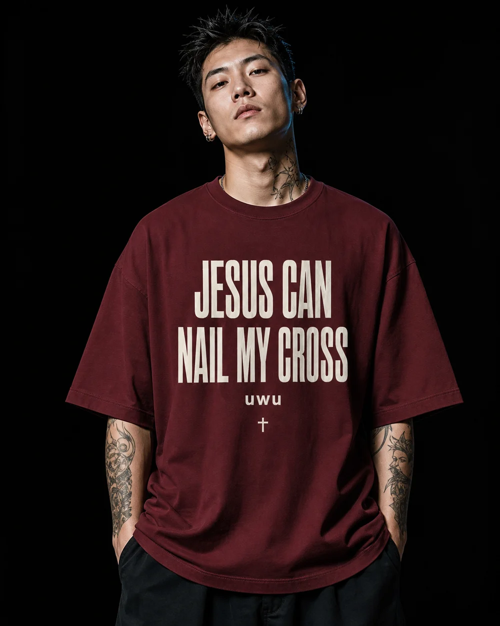 Model wearing the burgundy JESUS CAN NAIL MY CROSS uwu tee